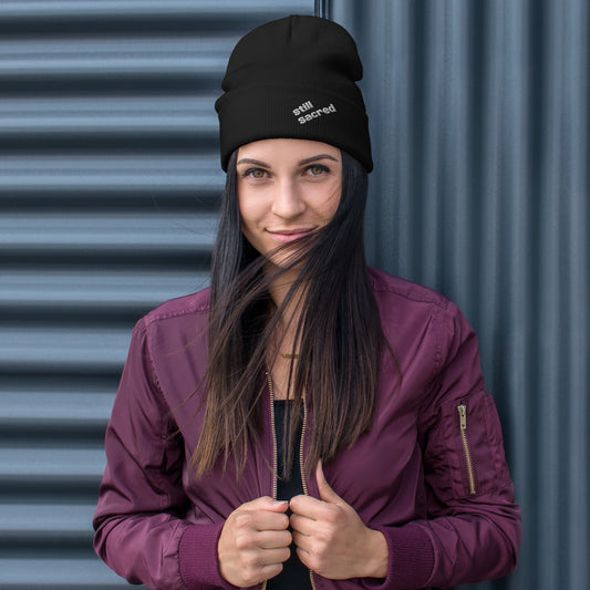 Black Still Sacred knit beanie – front view streetwear winter accessory