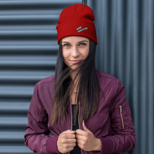 Red Still Sacred knit beanie – front view streetwear winter accessory