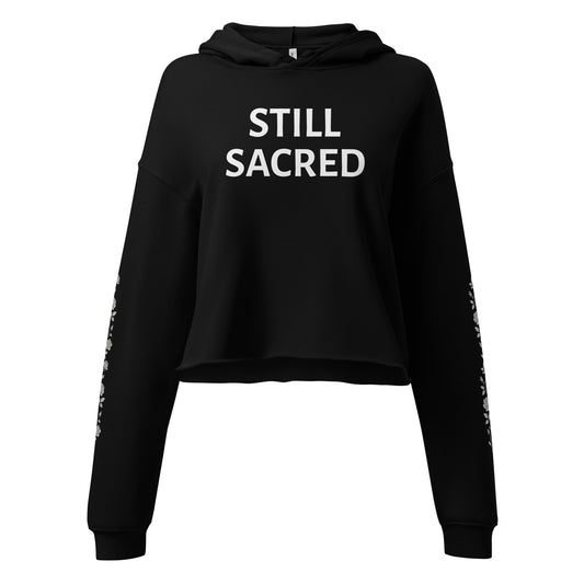 Still Sacred Crop hoodie flowers on left and right arm, front view